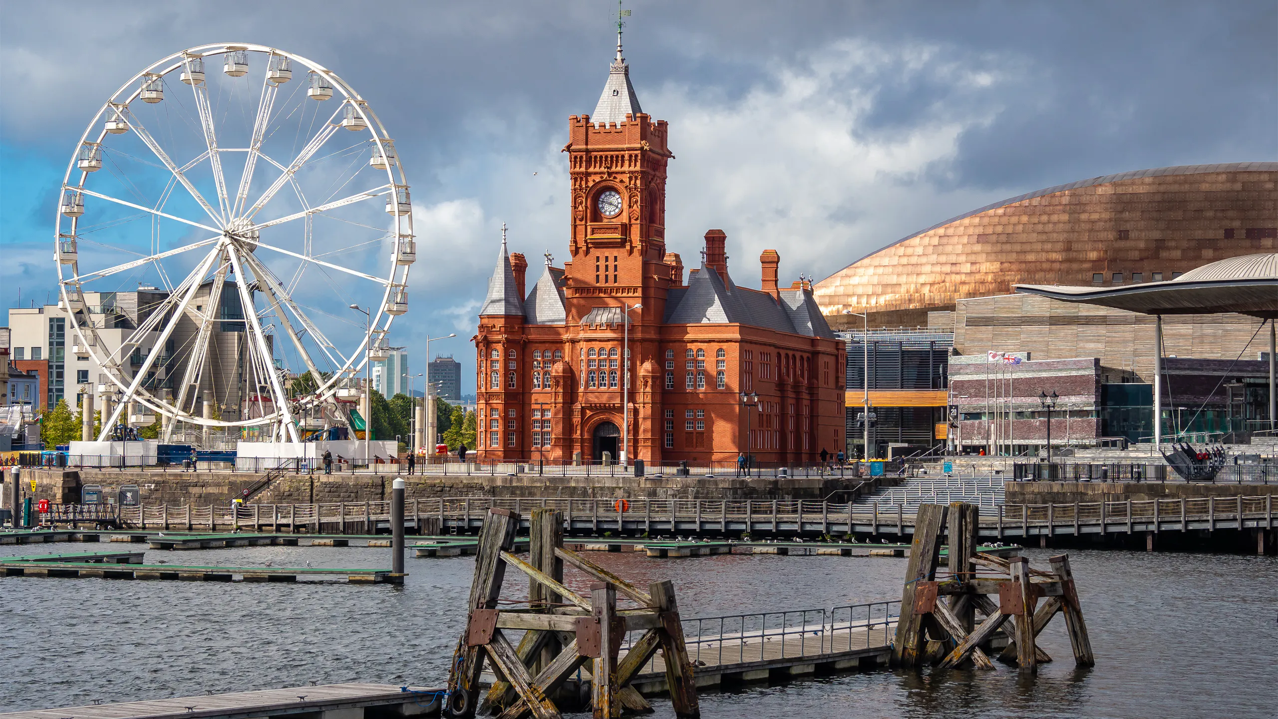Cardiff Bay skyline with Pierhead Building, Wales Millennium Centre, and city attractions.