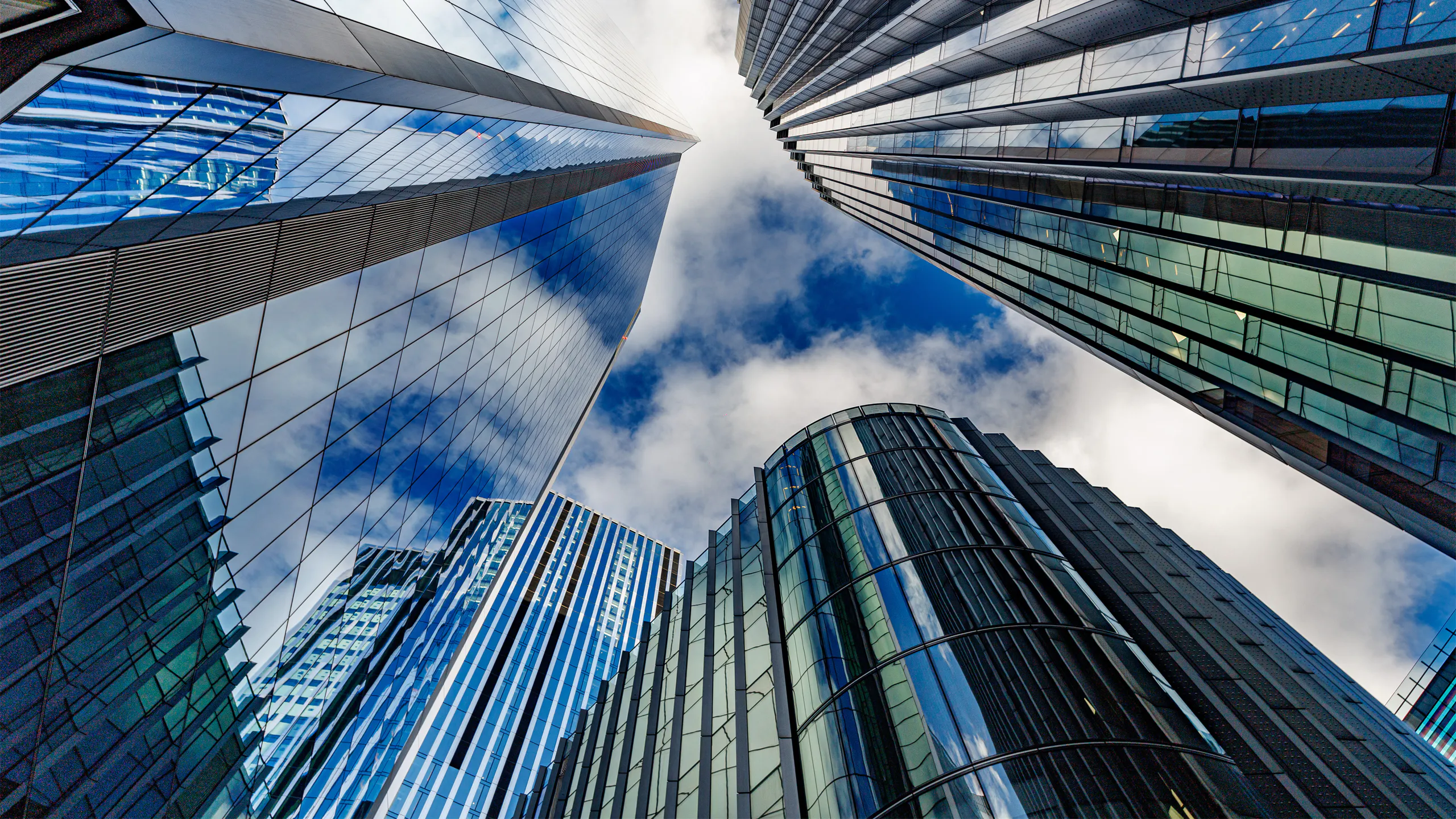 Futuristic cityscape with high-rise buildings in a corporate financial hub.